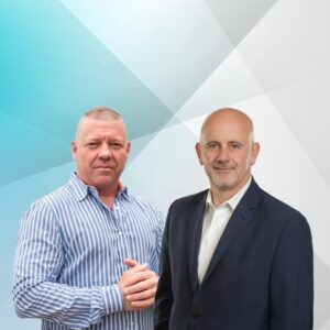 Jim and Pat smiling by being recognized by NJBIZ on Leaders in Finance Honorees List.