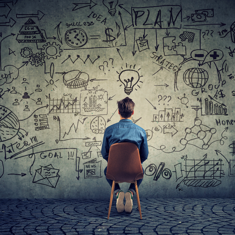 A man brainstorming on project management for Capacity Planning.