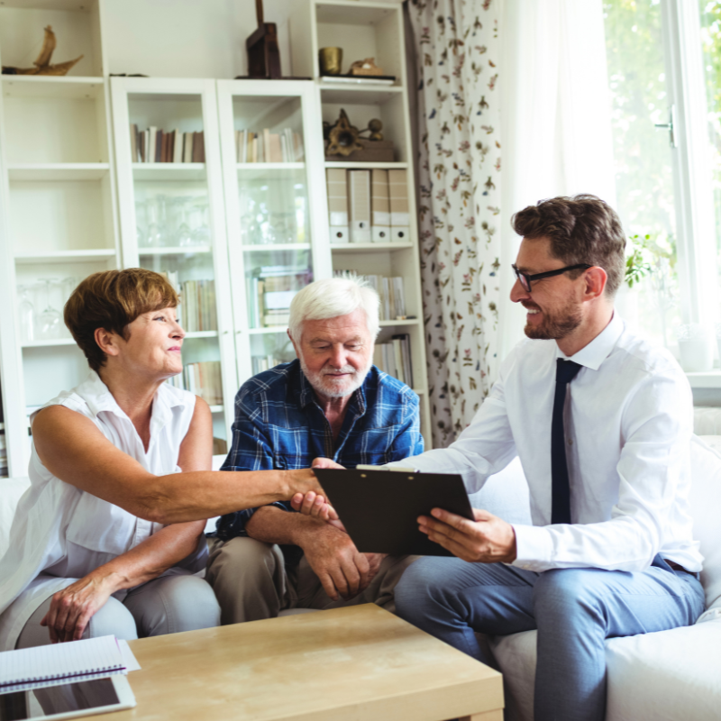 older couple meeting with financial advisor