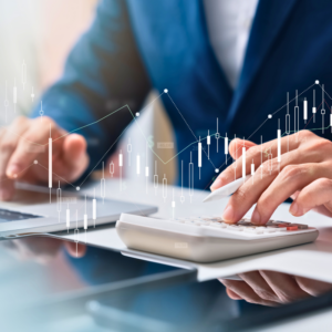 An advertising and Marketing person uses laptop and tablet analyzing company growth, future business growth arrow graph, development to achieve goals, business outlook, financial data for long term management.