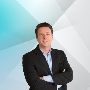 Michael Ritchie, smiling in a professional headshot.